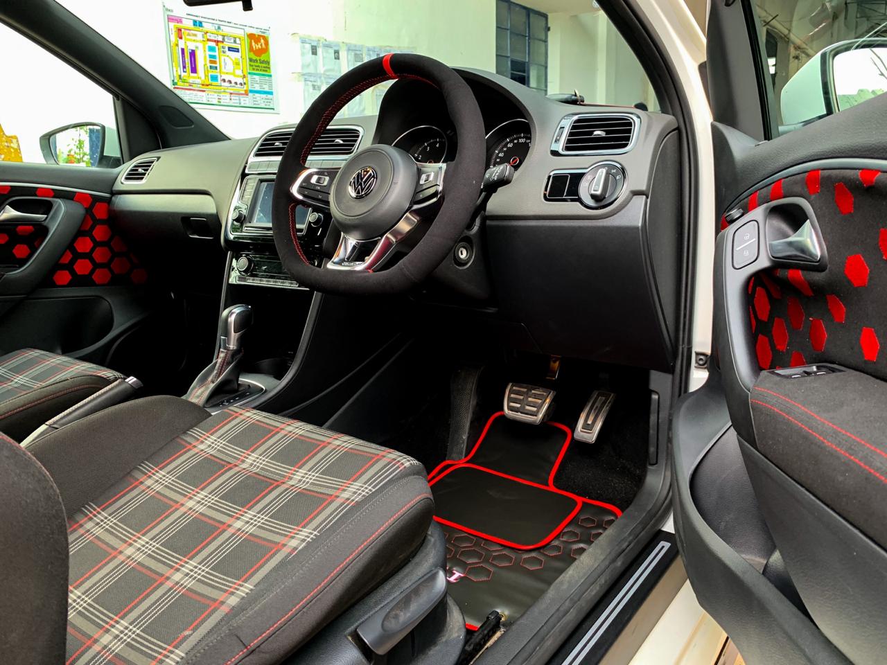 Car Interior modification: Custom Floor Mats, Door Pads, and Steering Cover, installed by CETUS, in a VW Polo GTI

